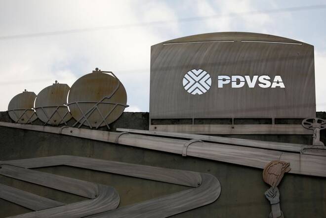Cutouts depicting images of oil operations are seen outside a building of Venezuela's state oil company PDVSA in Caracas