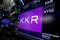 KKR & Co trading information is displayed on a screen on the floor of the NYSE in New York