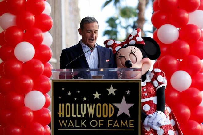 Bob Iger speaks next to the character of Minnie Mouse at the unveiling of her star on the Hollywood Walk of Fame in Los Angeles