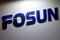 Company logo of Fosun International is seen at the Fosun Fair held alongside the annual general meeting in Hong Kong