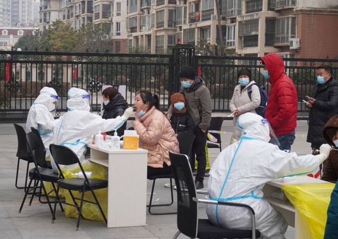 Residents line up for nucleic acid testing following COVID-19 outbreak in Zhengzhou
