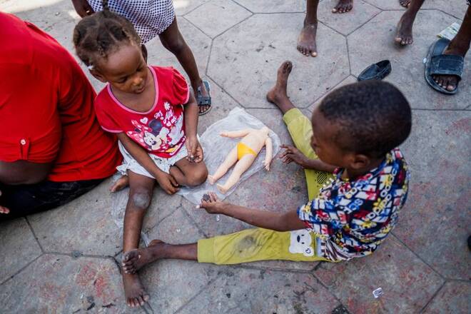 People displaced by gang war violence in Cite Soleil take refuge at the Hugo Chavez Square in Port-au-Prince.