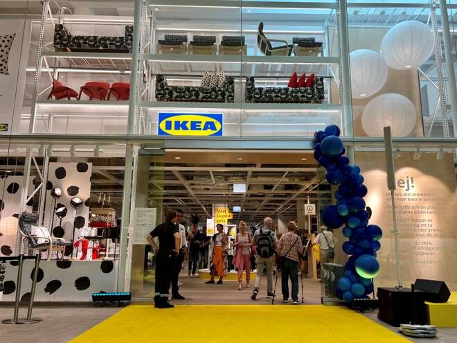 People enter an inner-city IKEA store on its opening day in Stockholm