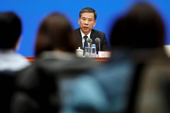 Chinese Finance Minister Liu Kun attends a news conference in Beijing