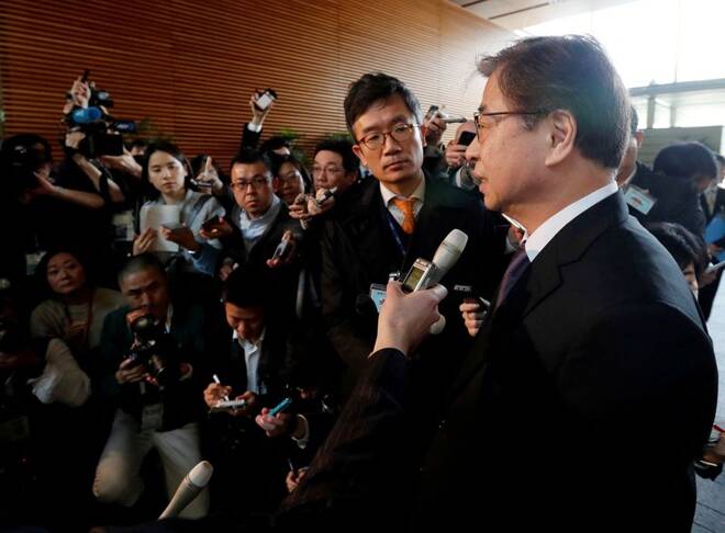 South Korea's National Intelligence Service chief Suh Hoon talks to reporters after meeting with Japan's Prime Minister Shinzo Abe in Tokyo