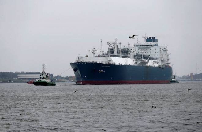 Floating storage regasification unit (FSRU) "Independence", is escorted to the liquefied natural gas (LNG) terminal in Klaipeda port