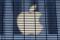 The Apple logo is seen through a security fence erected around the Apple Fifth Avenue store