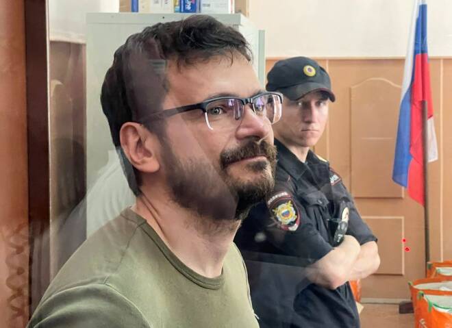 Russian opposition politician Ilya Yashin attends a court hearing in Moscow