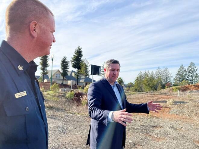 Fire Chief Scott Westrope and Mayor Chris Rogers survey the empty lot where the previous office of Santa Rosa Fire Station 5 was destroyed in Santa Rosa