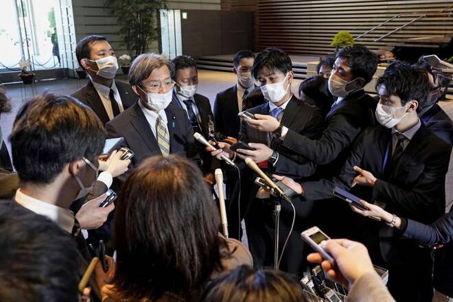 Japan's Reconstruction Minister Kenya Akiba speaks to media as he announces his resignation in Tokyo