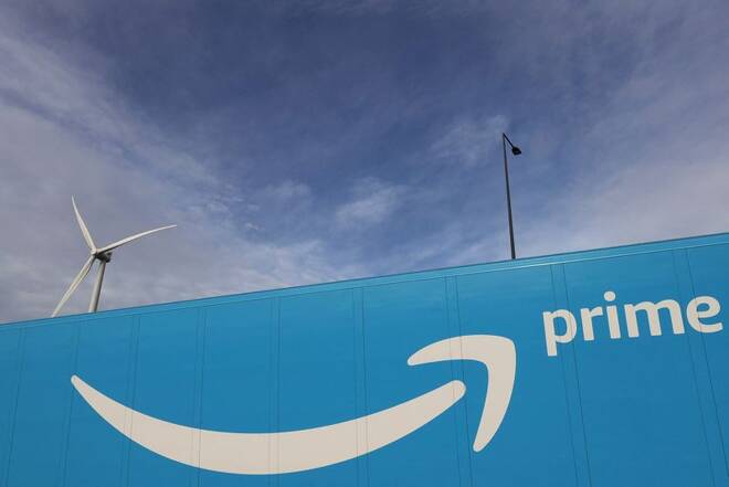 Amazon Prime Delivery logo on the trailer of a truck outside the company logistics center in Lauwin-Planque
