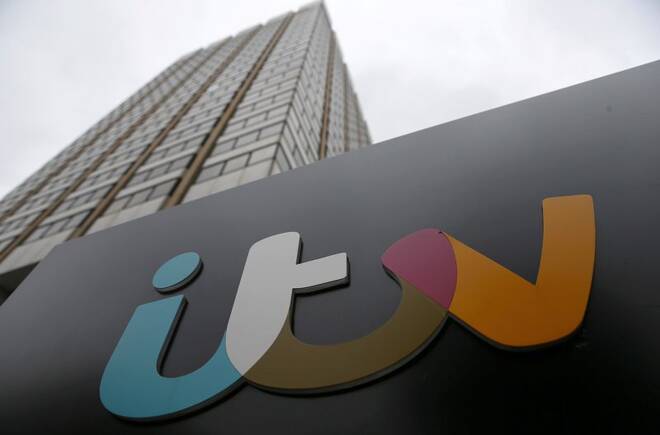 A company sign is displayed outside an ITV studio in London