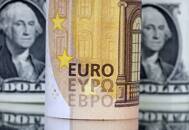 Illustration shows U.S. Dollar and Euro banknotes