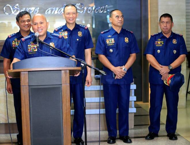 PNP Chief Ronald dela Rosa with police Senior Superintendent Graciano Mijares during the re-launch of police anti-narcotics operations at a news conference inside the police headquarters in Quezon city