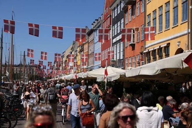 Danish flags are seen hung over Nyhavn in Copenhagen