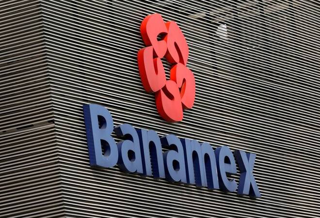 The logo of Banamex bank is on a branch in Mexico City