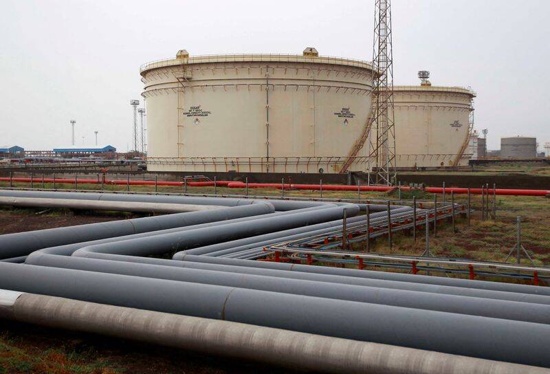 Storage tanks of an oil refinery of Essar Oil are pictured in Vadinar