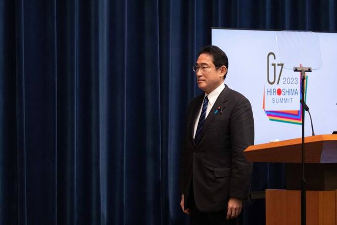 Fumio Kishida attends a news conference in Tokyo