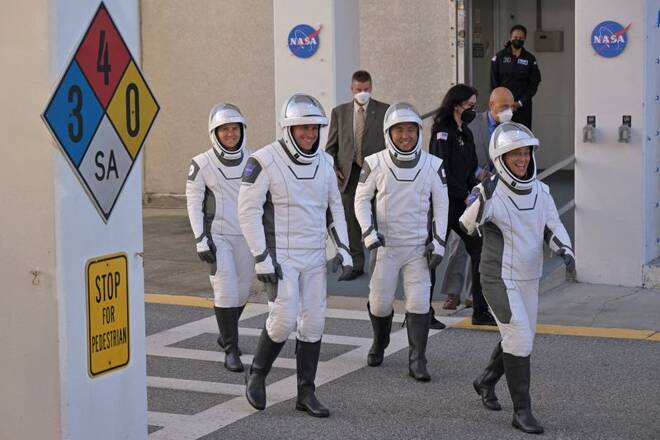 NASA's Crew 5 members depart their crew quarters for launch aboard a SpaceX Falcon 9 rocket at the Kennedy Space Center