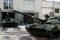 Employees drive T-72 battle tanks at the Kyiv Armoured Plant in Kyiv