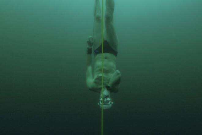 Czech freediver Vencl dives to 52 metres under the ice in Sils