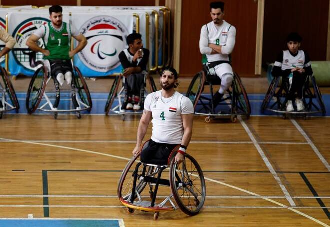 Iraqi former footballer Ahmed Nasser, who lost his leg during a bomb attack in Baghdad in 2007, plays basketball with Iraq's Paralympic team in Baghdad