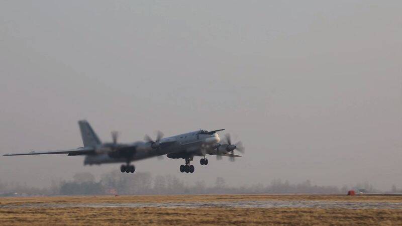 A Russian Tu-95MS strategic bomber takes off in an unknown location to perform a flight over the neutral waters of the Sea of Japan