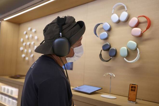 A customer listens to music in a store in Los Angeles, California