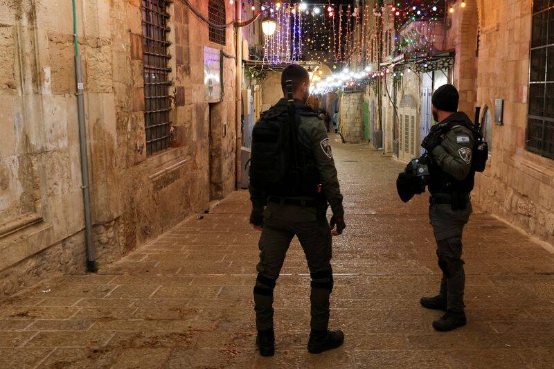 Israeli police stand guard near a security incident scene, in Jerusalem's Old City
