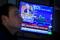 Traders react to Fed rate announcement on the floor of the NYSE in New York