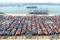 Containers and cargo vessels at the Qingdao port