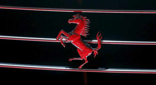 Photo of a Ferrari logo seen on the grille of a Ferrari GTC4Lusso car at the 86th International Motor Show in Geneva