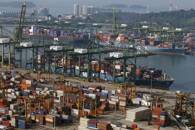 A ship docks at PSA's Tanjong Pagar container port in Singapore