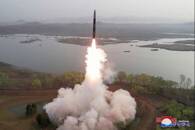 A view of a test launch of a new solid-fuel intercontinental ballistic missile (ICBM) Hwasong-18