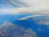 An aerial view shows smoke rising from a fire in the Cerbere region