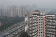 Residential buildings are seen along the Fourth Ring Road in Beijing