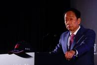 Terry Gou, the founder of major Apple supplier Foxconn and a contender to be Taiwan's next president speaks to the media in Taipei