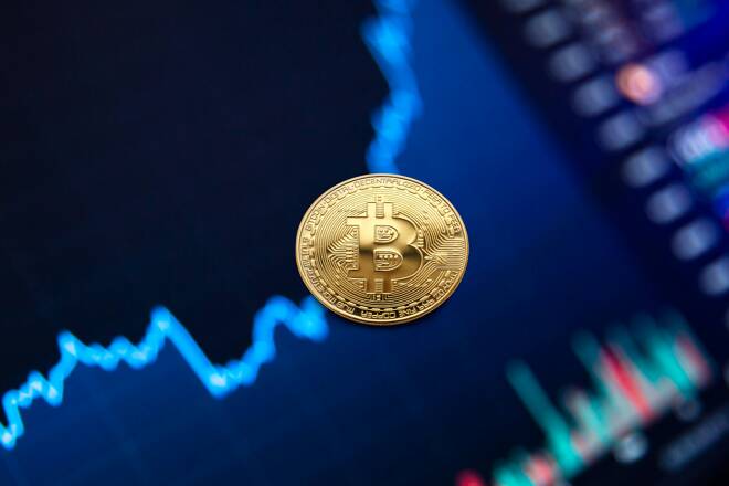 Bitcoin over a chart, FX Empire