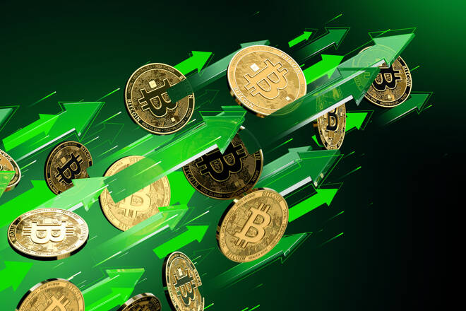 Bitcoins and up green arrows, FX Empire