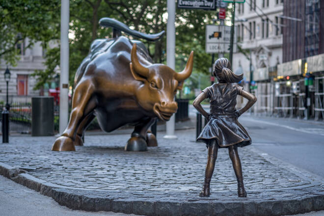 Girl in front of bull statue, FX Empire