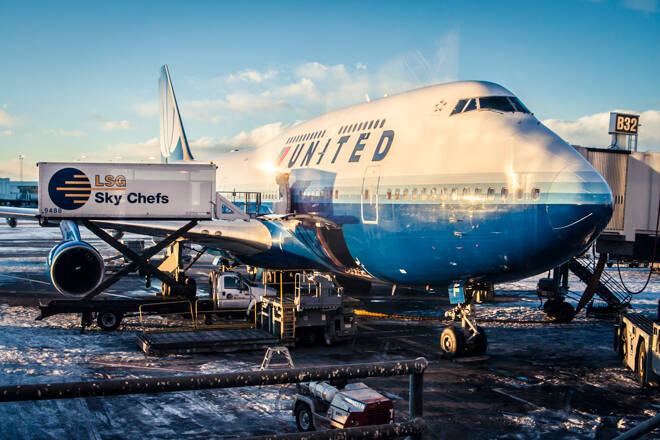 Washington DC, USA - United Airlines 747 being loaded with food before departure at Washington Dulles International Airport. FX Empire