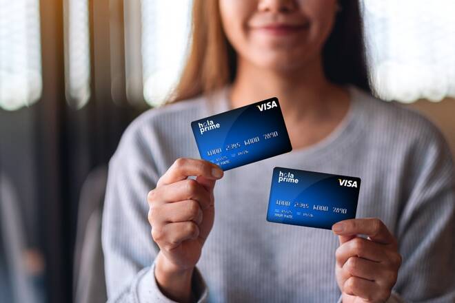 Girl with Hola Prime new VISA cards. FX Empire