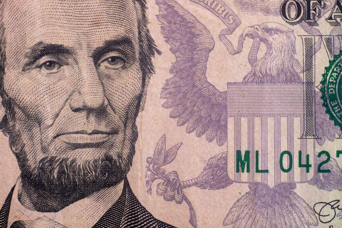 US Dollar and Lincoln face. FX Empire