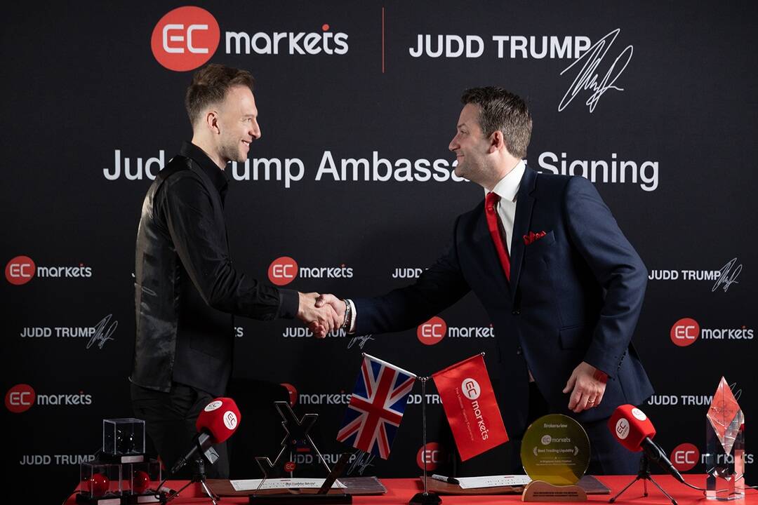 Judd Trump and Matthew Smith shaking hands. FX Empire