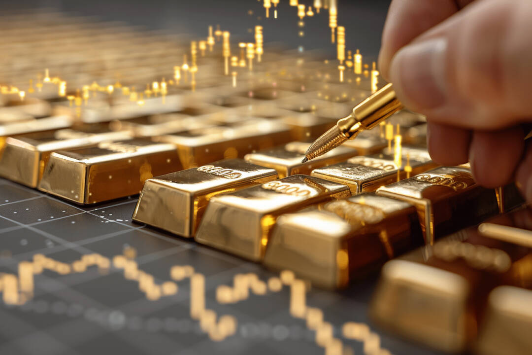 Gold bullion and golden chart, hand with a pen. FX Empire