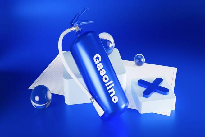Gasoline bottle composition on blue background. FX Empire