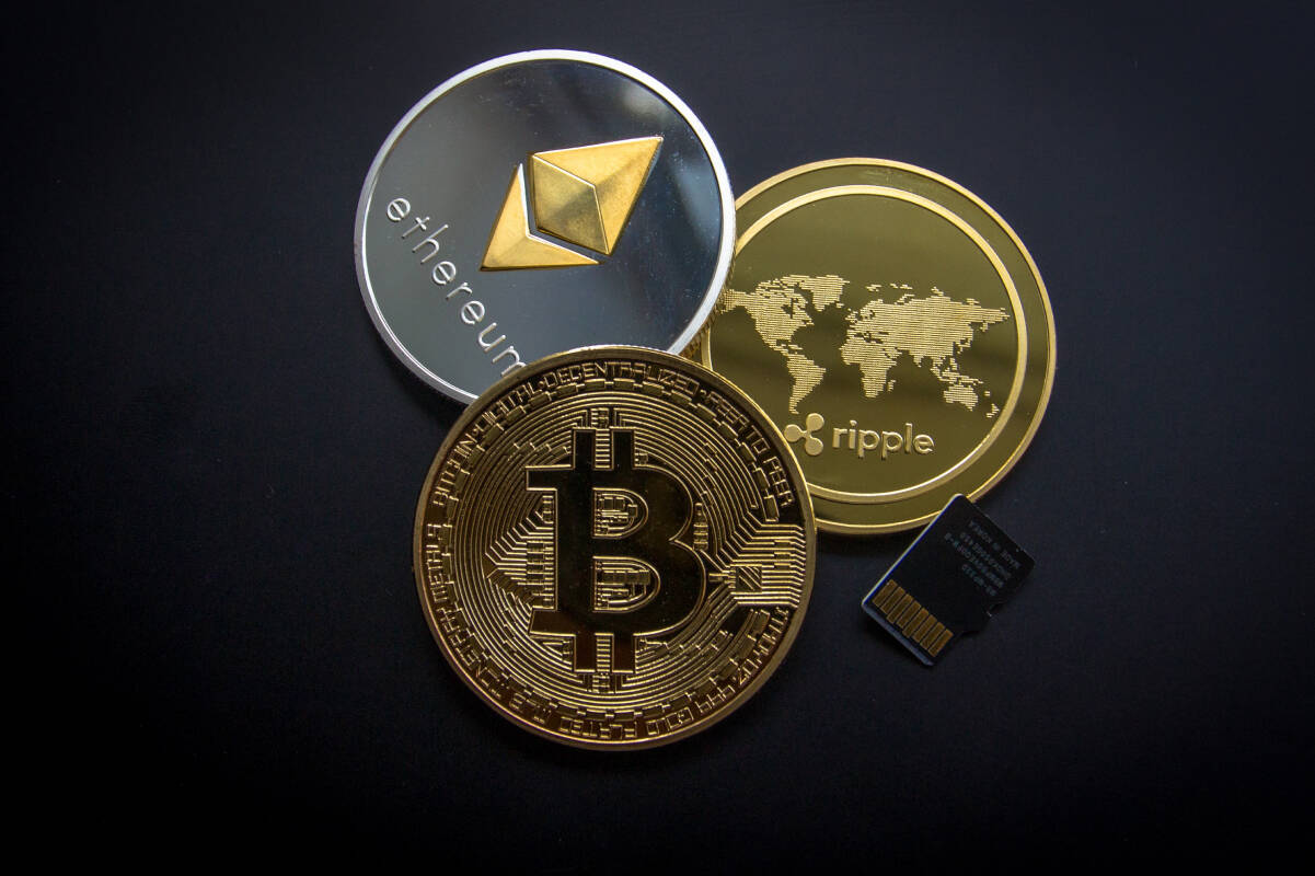 ETH, BTC and XRP coins. FX Empire