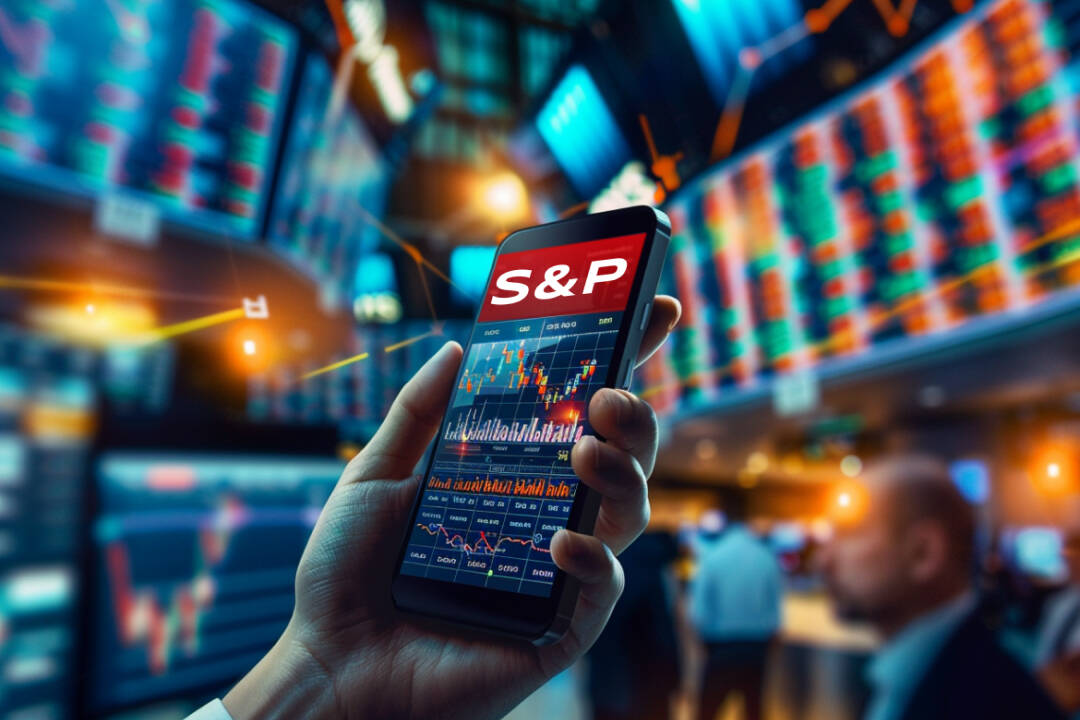 S&P logo in smartphone. FX Empire