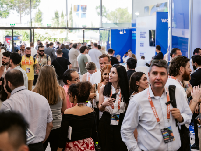 People at iFX EXPO International. FX Empire