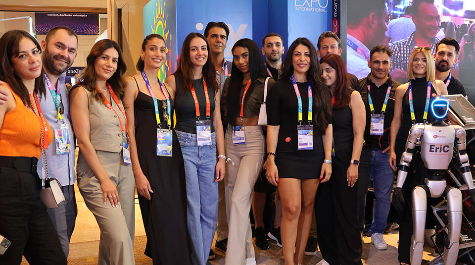 A group of people posing for a photo AI-generated content may be incorrect.
